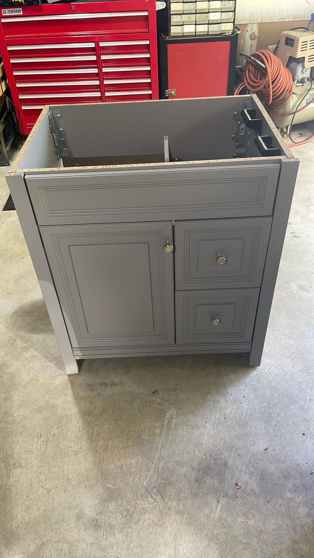 30 inch wide by 34 inch tall gray vanity brand new never used