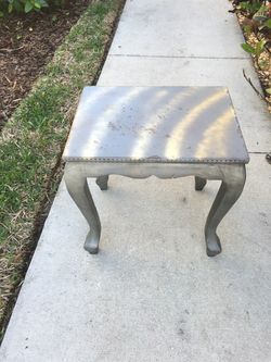 Very cute small distress table gray with gold on top
