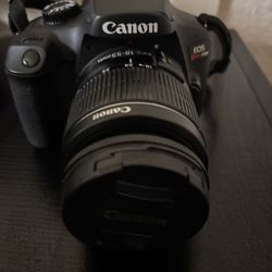 Canon T100