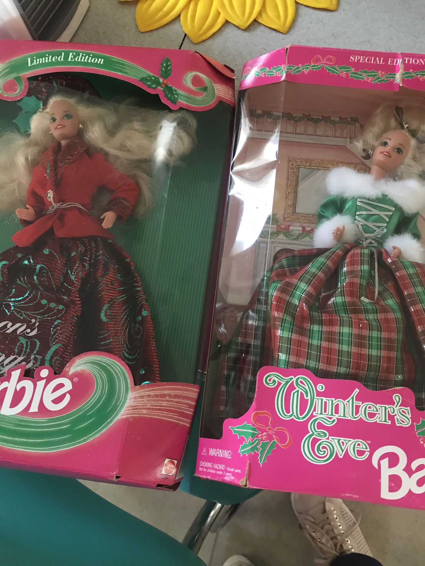 Two Christmas barbies