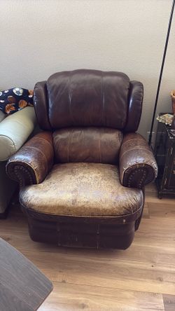 Leather rocking recliner with extendable footrest
