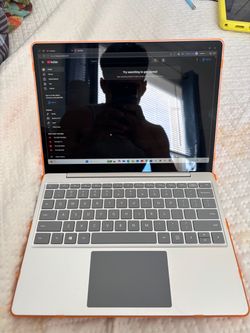 Microsoft Surface Go Laptop with Orange Case