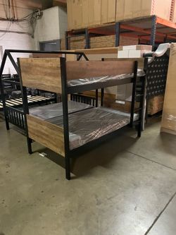 Twin bunk bed. Comes in espresso. Assembly required. Assembly not included. Taxes included. Free delivery.  Bunk bed only-$220 Bunk bed with mattresse