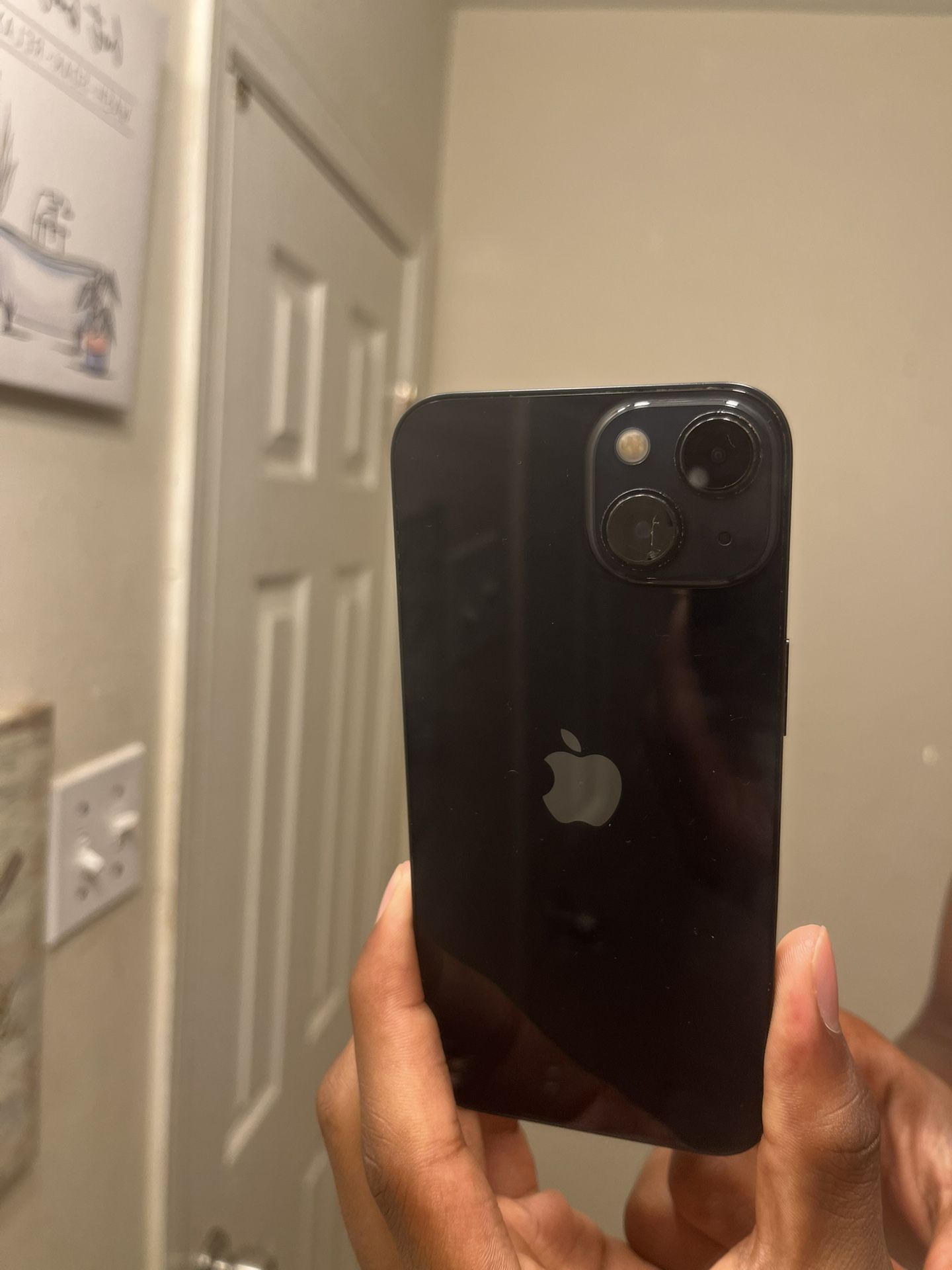 This Is A iPhone 13 . Mid knight-black. It’s Is 6.1 Inches