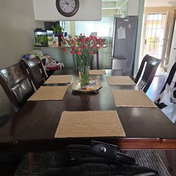 Table And 8 Chairs