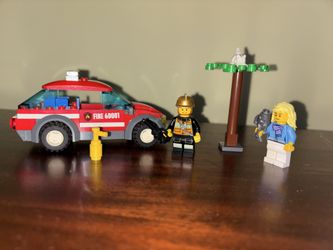 Retured Lego city fire chief car 60001 His hat is a little scuffed and it is not the right girl $15