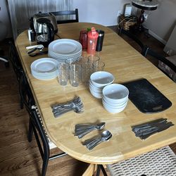 Kitchenware set includes plates, bowls, cups, silverware ect.