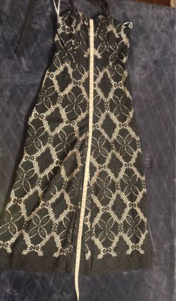 New York company Black and Cream Lace Halter Jumpsuit. SIZE M