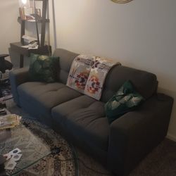 Love Seat, Couch, Two Rest Pillows And A Blanket