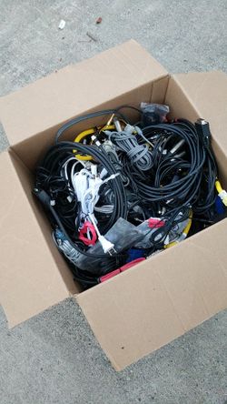 Box full of miscellaneous cables audio, video, computers, power e.t.c