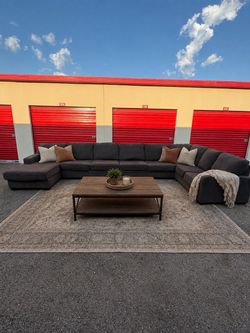 Ashley Furniture Large Sectional& Coffee Table – $799 – Delivery Available