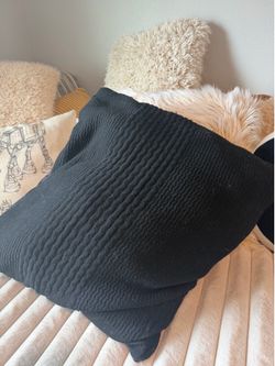 Black oversized throw pillow