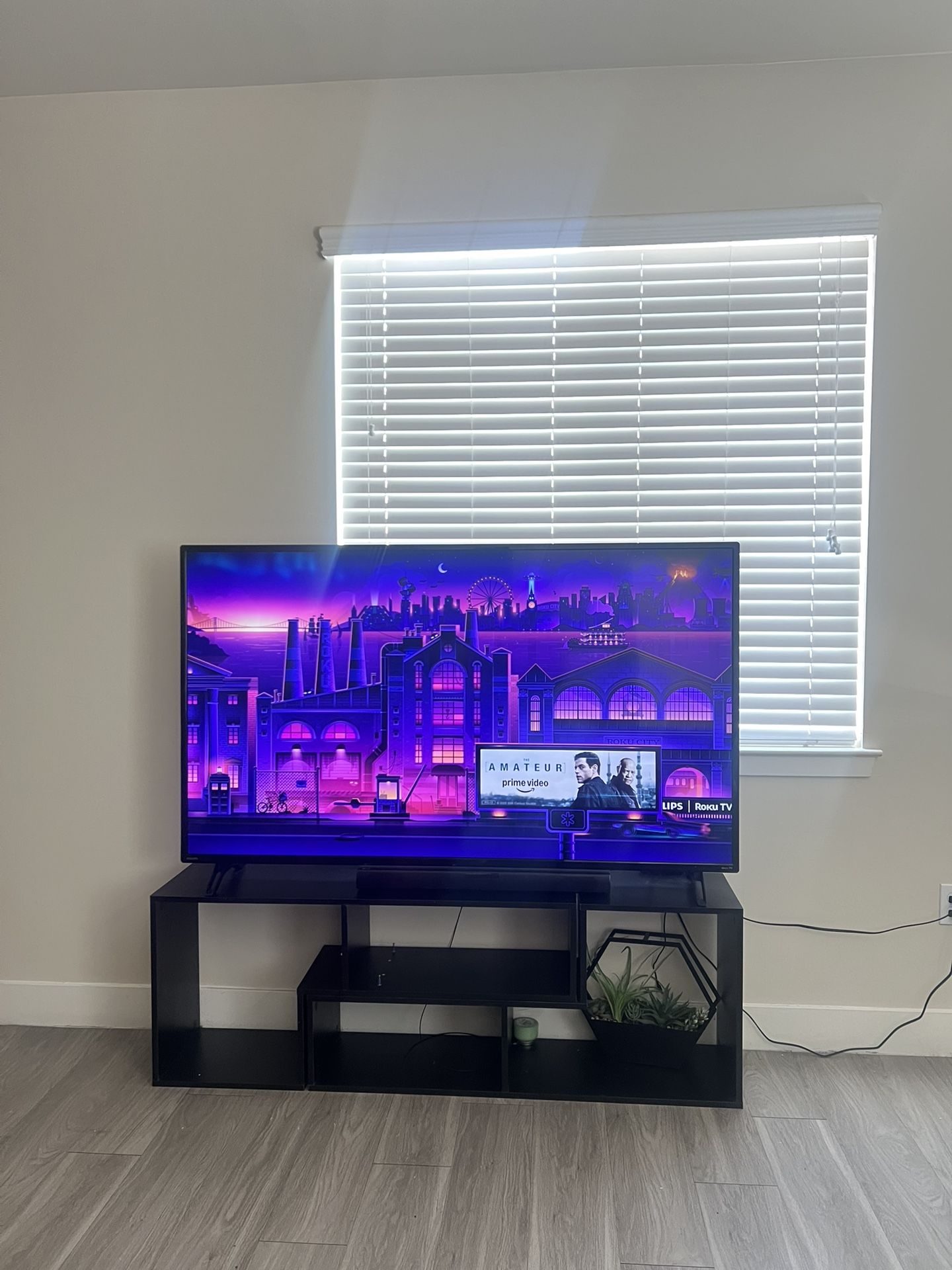 Brand new Roku 65 inch Tv. Comes with Stand, Roku remote and LG speaker is included.