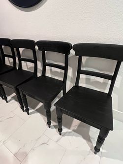 4 like new black wooden dining chairs - RH