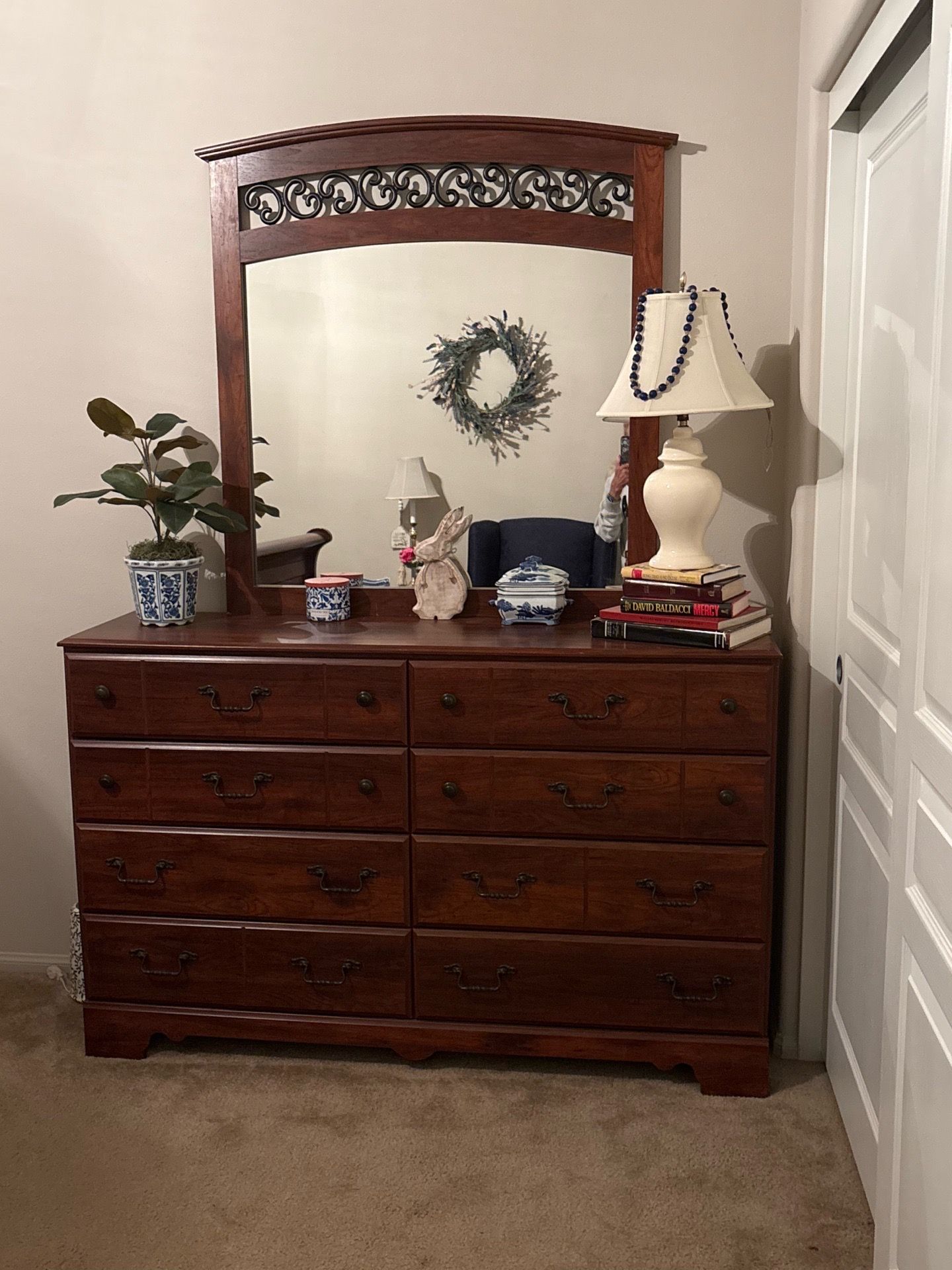 Chest of drawers with mirror.