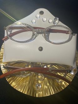 One (1) Millionaire Celebrity Italian Unisex wooden frame with sparkling lab, diamond ice trim. Comes with a white protective case for secure storage.