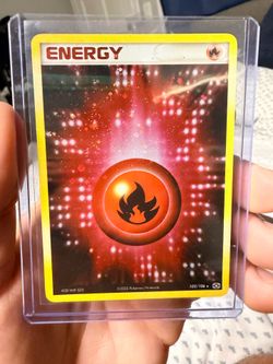 Fire Energy Ex Emerald Holo Rare Pokemon Card with swirl