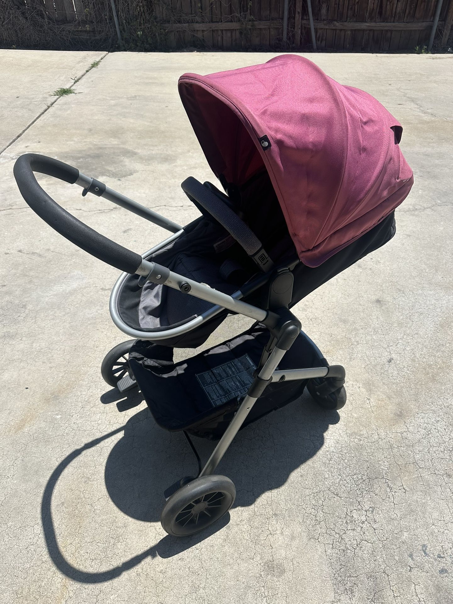 Evenflo Pivot Modular Travel System With Bassinet (dusty rose pink)