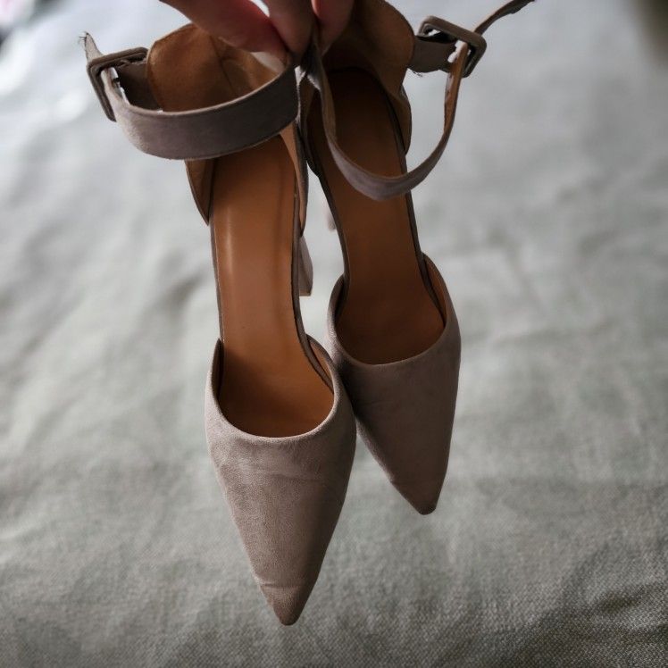 Pointed toe (gray) heels with ankle strap.