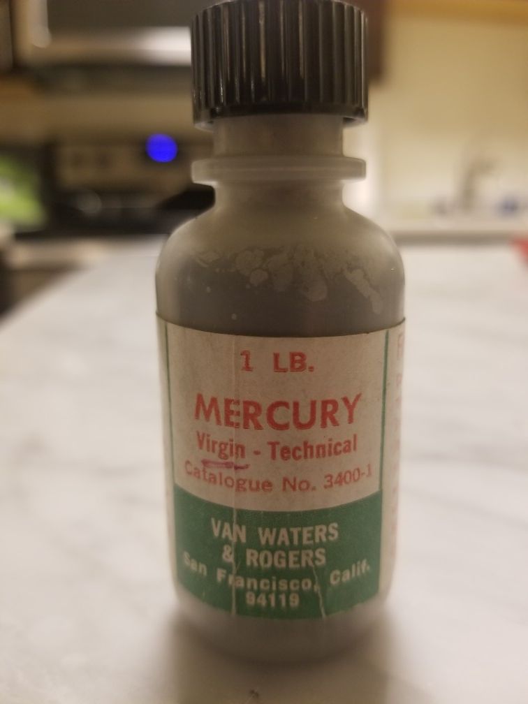 One pound liquid mercury. Liquid metal, element.