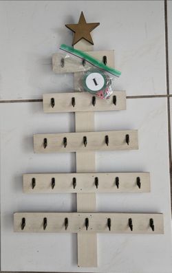 Wood Wall Christmas Advent Tree, 26"H x15"W. Comes with hooks & number tags. $30 firm. Local pick‑up.