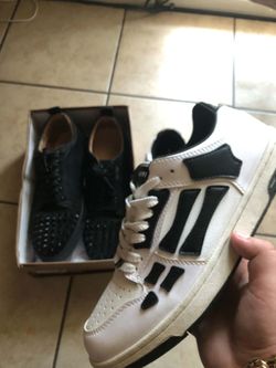 Amiri skeleton and beat red bottoms