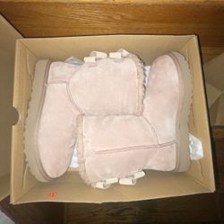 BRAND NEW UGGS, Light Pink, With Tan Leather Bows.