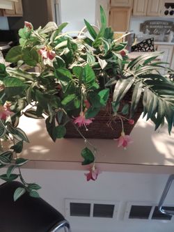 Artificial flowers and planter