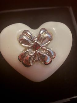 Medium Size Resin Ring With a Flower Designed Decoration and Red Rhinestone