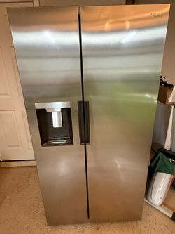 Used  in verry good condition Midea refrigerator is a 26.3-cu ft side-by-side model in stainless steel