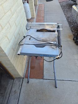 Ryobi table saw.       $40 cash