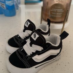 Black and White Infant Vans