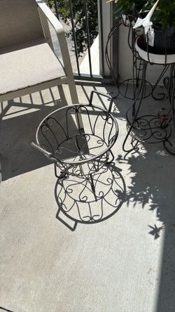 Rod iron plant stands
