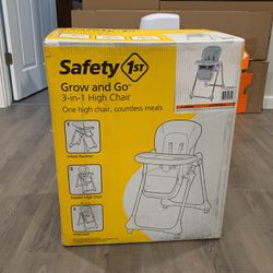 High Chair (never  opened)