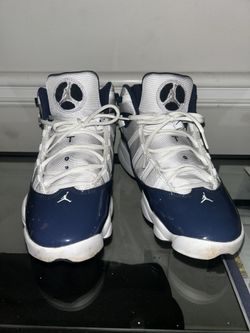Navy and white Jordan 6 Rings trainer