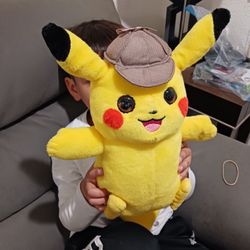 12"  Talking Pokémon Detective Pikachu from Movie interactive Plush.  2 voice modes, and move its ears when talk.  Good Condition. 
