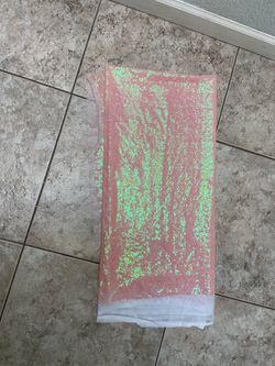 Salmon pink sequin fabric