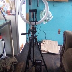 Phone tripods large and small with selfie lites with 3 settings and a camara remote