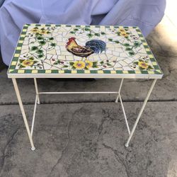 A country style mosaic rooster side table