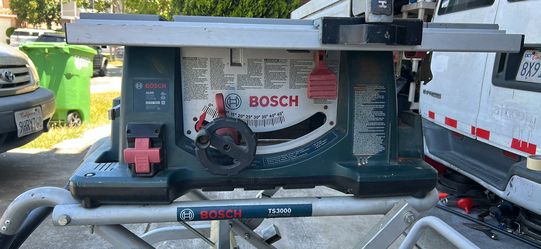 Bosch 10 inch table saw model 4100 with on wheels stand