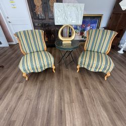  2 T.H. Robsjohn-Gibbings chairs covered in Lou Lou de la Falaise fabric With carved legs