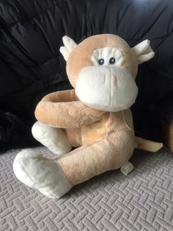 Stuffed monkey with rattle inside.  