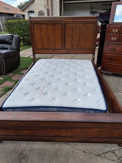 Wooden queen sized bed frame