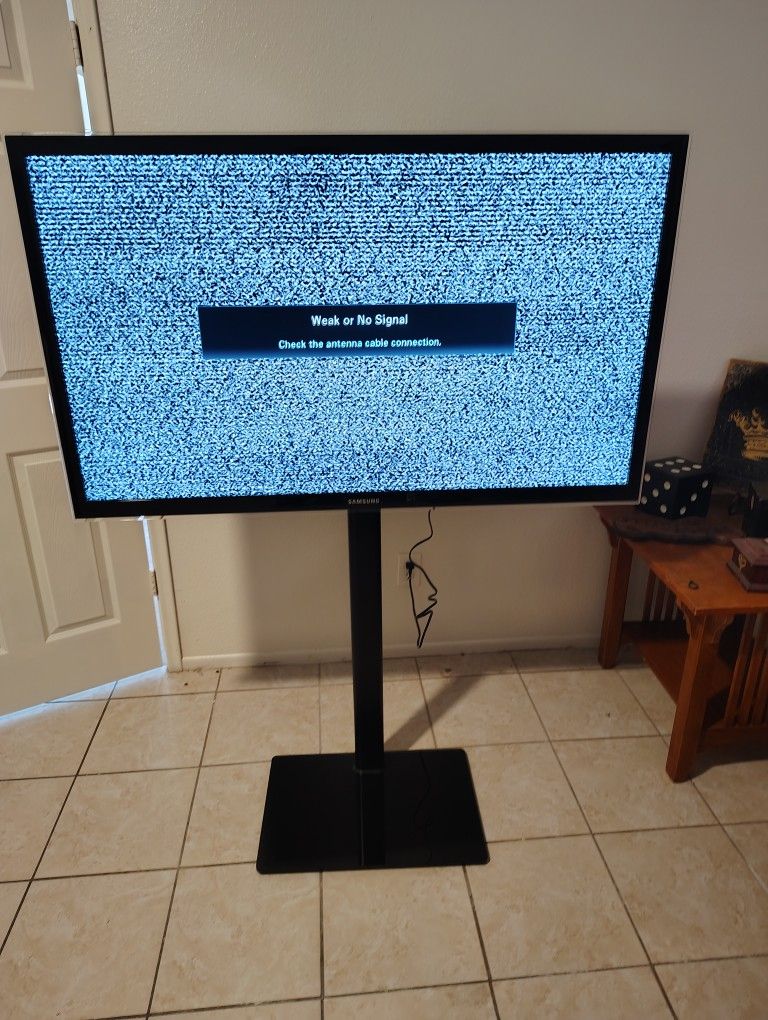 Samsung 55 Inch Flat Screen With Stand.