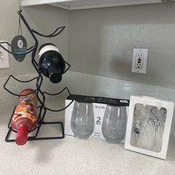 His and hers stemless wine glasses,  2 piece wine stopper and wine cork screw