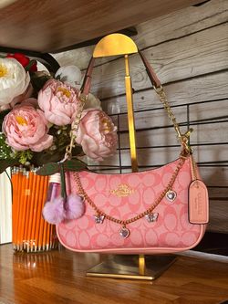 Pink Coach Bag with accessories