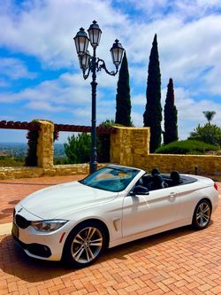 2015 BMW 428i hardtop, electric convertible