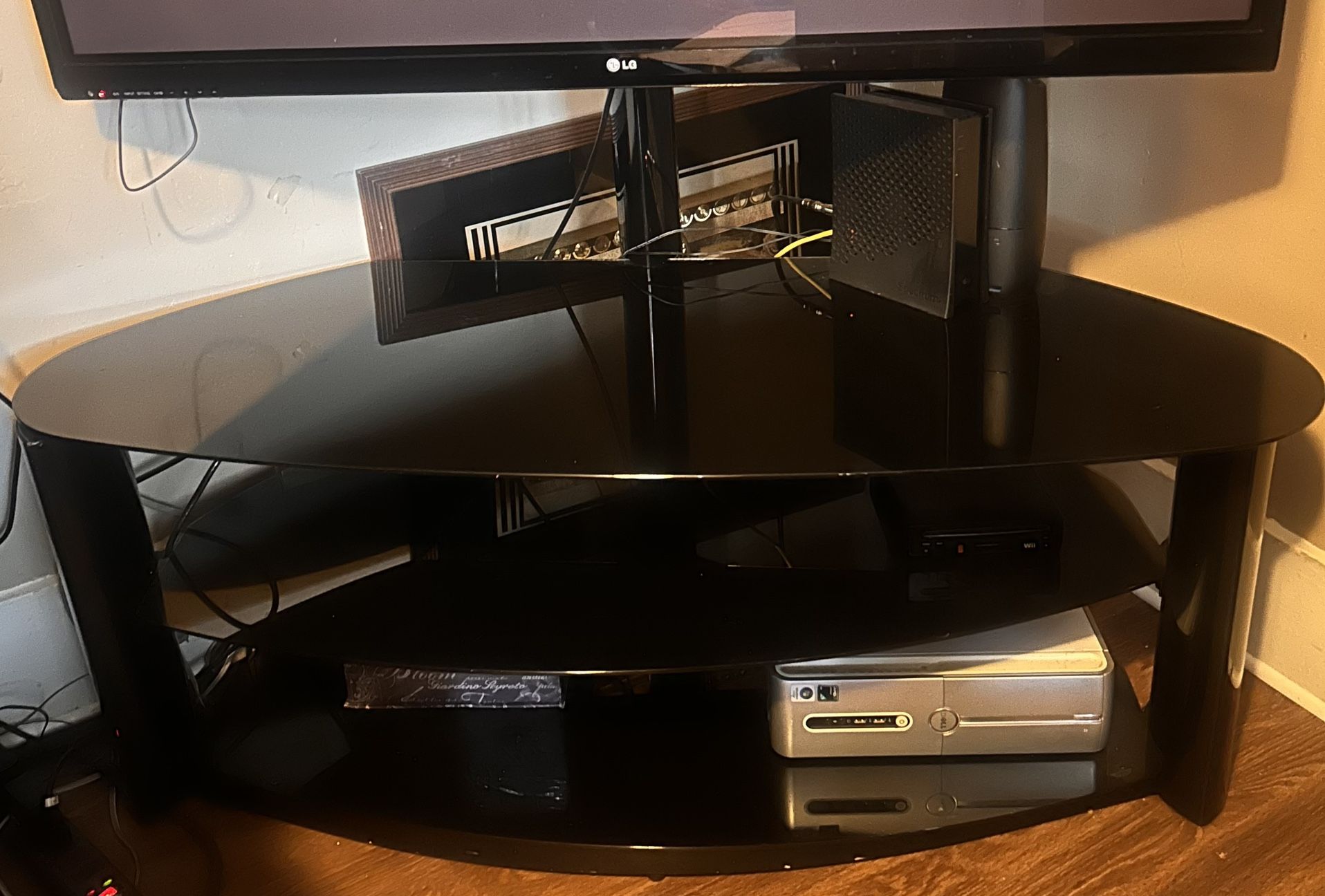 Black Glass Entertainment Center With 3 Shelves
