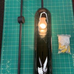 modern black pendant light with a smoked glass shade. 