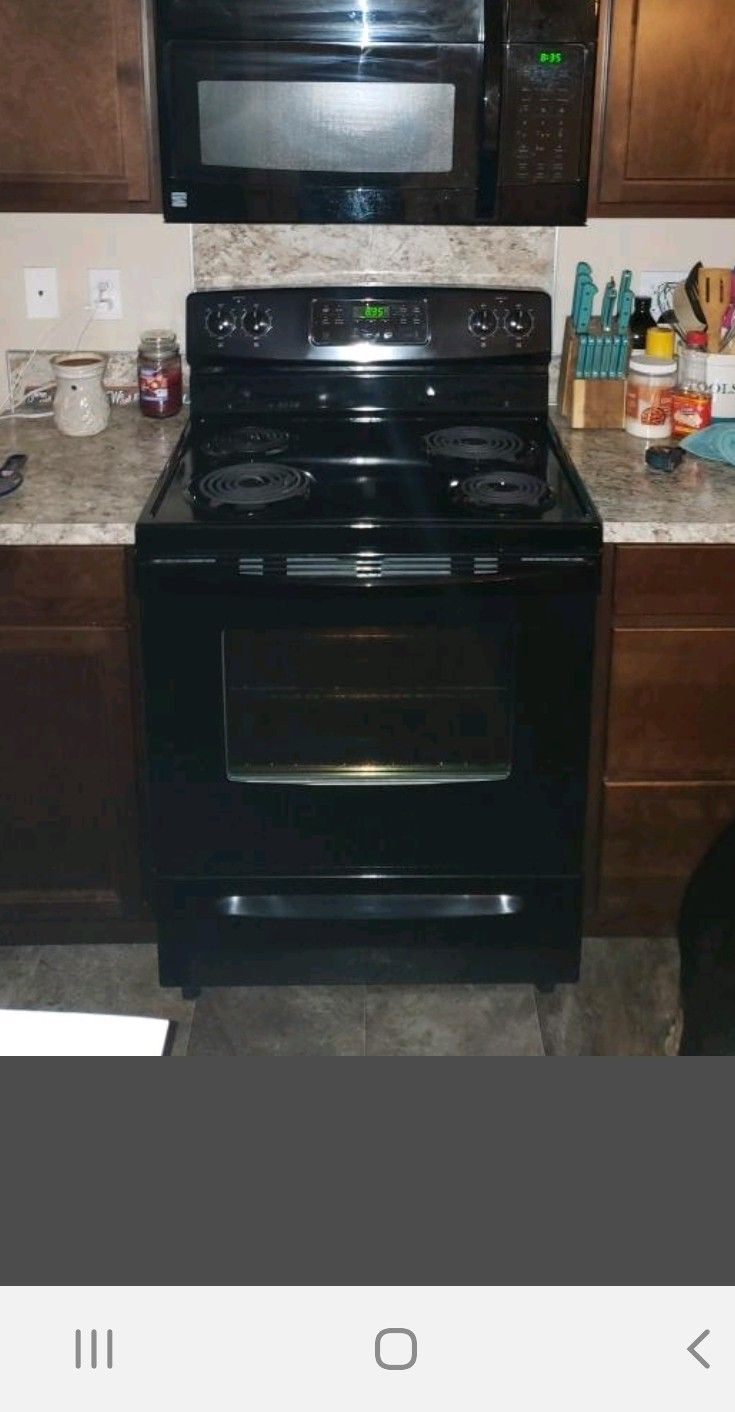 Kitchen appliances- Stove, microwave and dishwasher